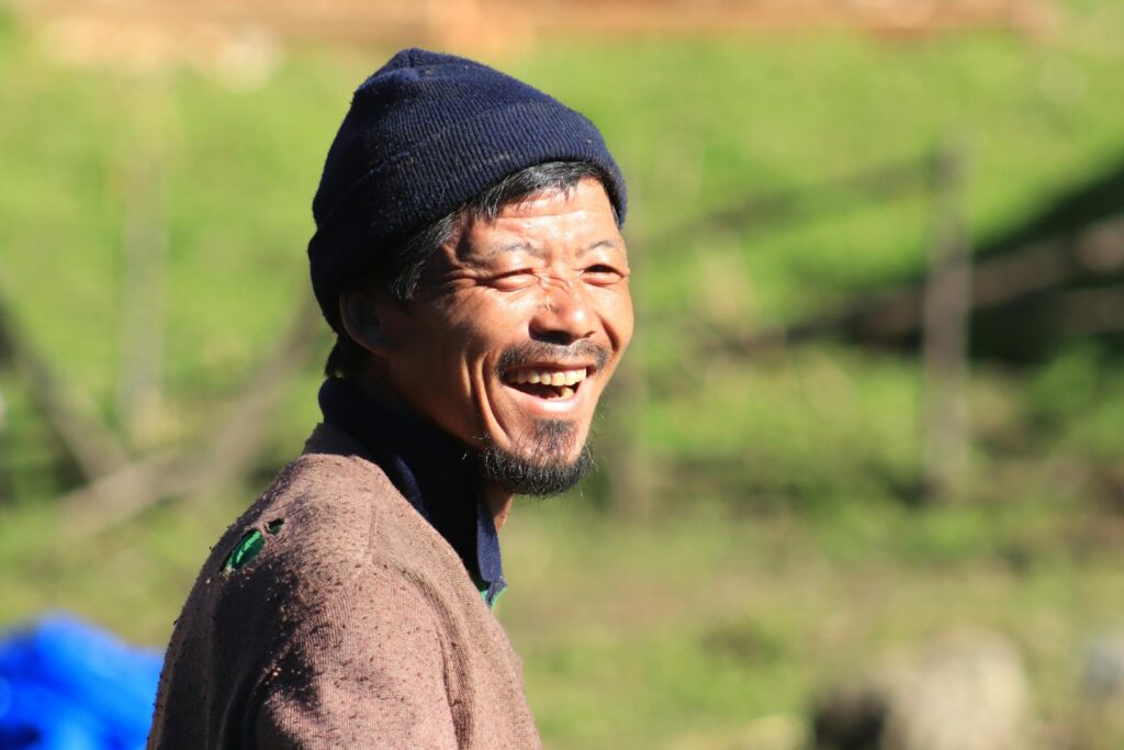 Man in Blue Beanie Laughing