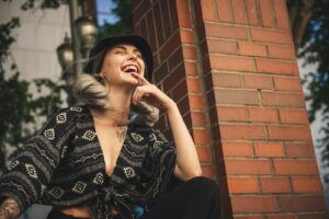 Low Angle Photo of Smiling Woman Wearing Crop Top