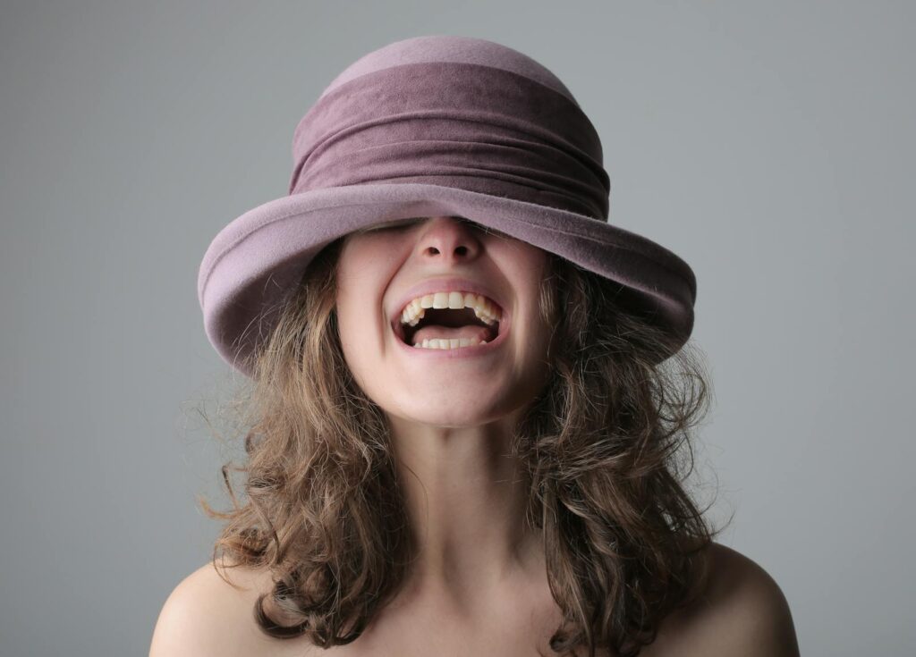 Woman in Purple Hat